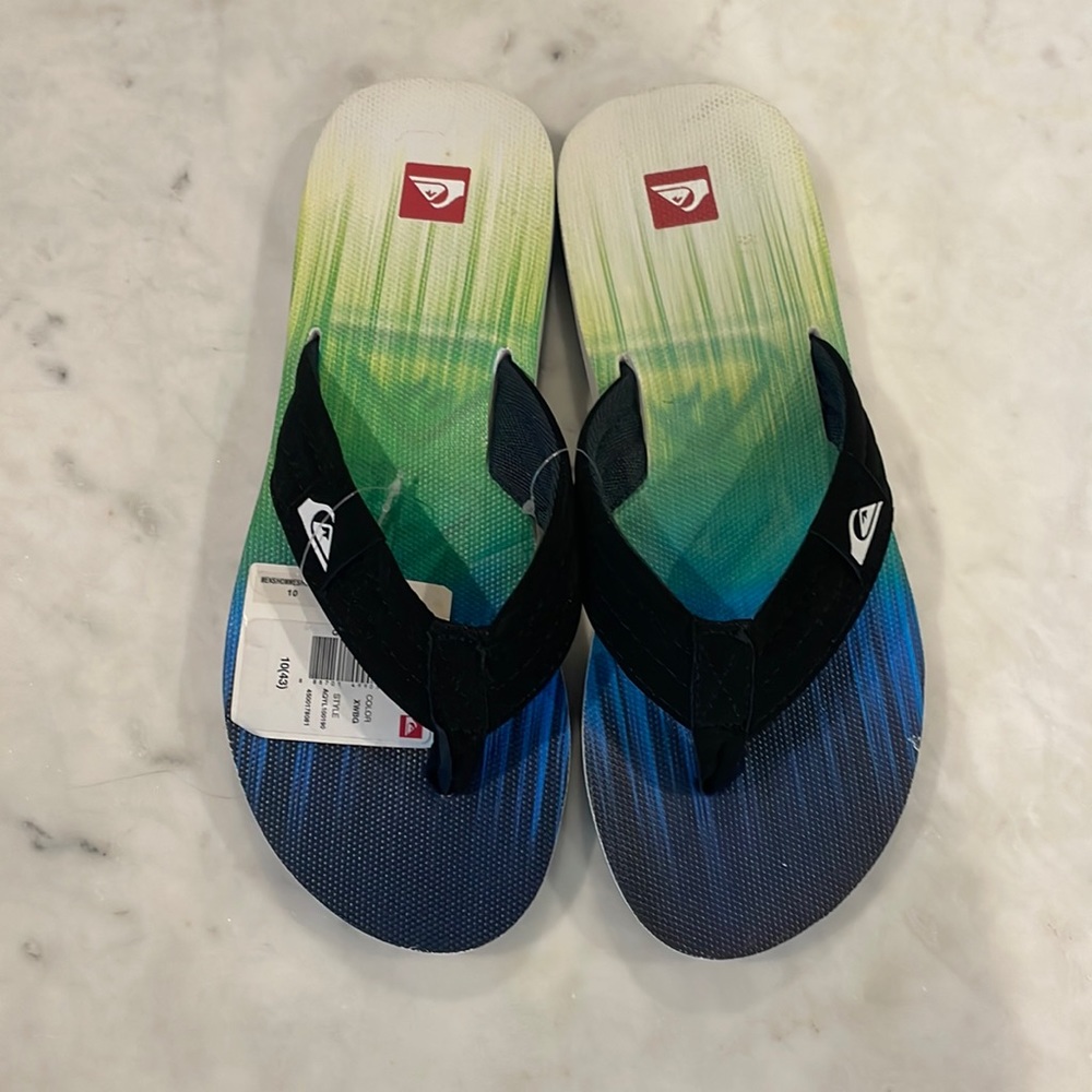 Quicksilver flip-flops. Can be unisex!